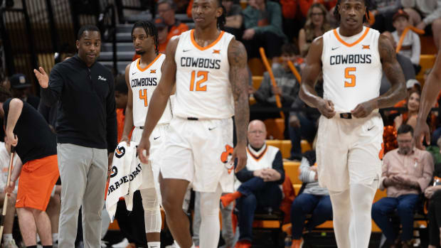 Jan 6, 2024; Stillwater, Okla, USA; Oklahoma State Cowboys head coach Mike Boynton talks with Oklahoma State Cowboys guard Jarius Hicklen (4) in the first half of an NCAA men s basketball game at Gallagher-Iba arena. Mandatory Credit: Mitch Alcala-The Oklahoman